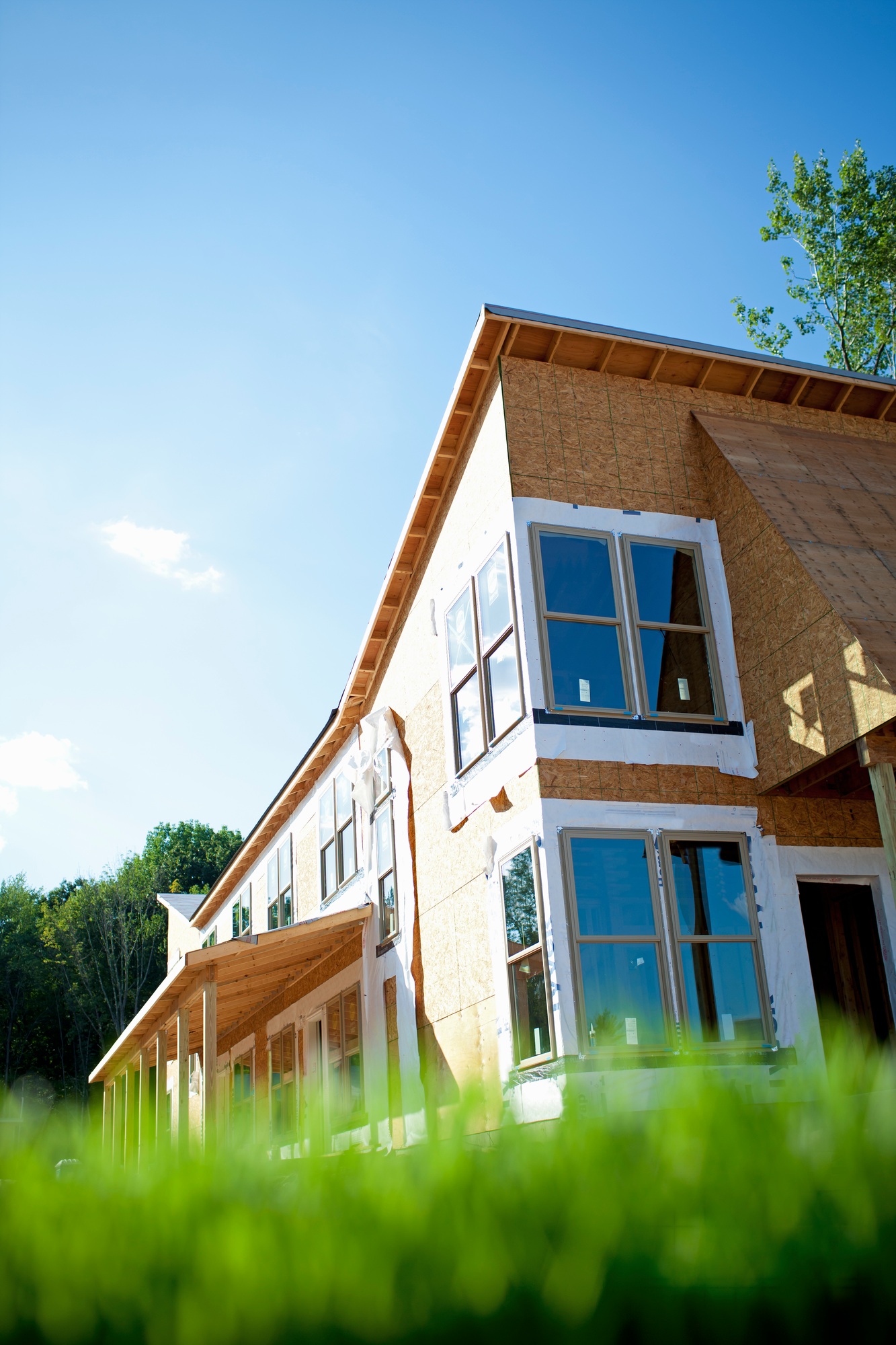 A construction site, a domestic house being built in a rural setting in New York State, USA